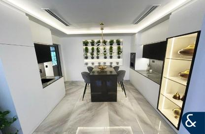 Villa - 4 Bedrooms - 4 Bathrooms for sale in Whispering Pines - Jumeirah Golf Estates - Dubai