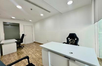 Office Space - Studio - 4 Bathrooms for rent in Hamdan Street - Abu Dhabi
