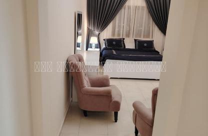 Apartment - 1 Bedroom - 2 Bathrooms for rent in Abu Shagara building - Abu shagara - Sharjah