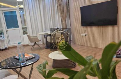 Apartment - 2 Bedrooms - 2 Bathrooms for sale in Orient Tower 1 - Orient Towers - Al Bustan - Ajman