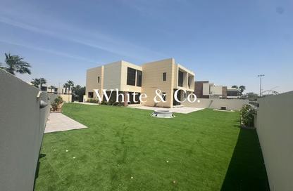 Townhouse - 4 - 5 for sale in Queens Meadow - Damac Hills - Dubai