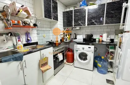 شقة - 2 غرف نوم - 2 حمامات للبيع في إس05 - طراز أسباني - المدينة العالمية - دبي