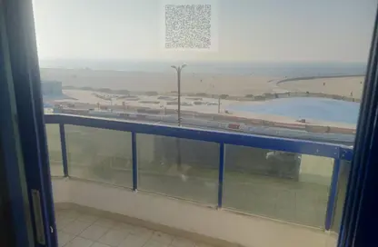 Apartment - 1 Bedroom - 2 Bathrooms for rent in Corniche Tower - Ajman Corniche Road - Ajman