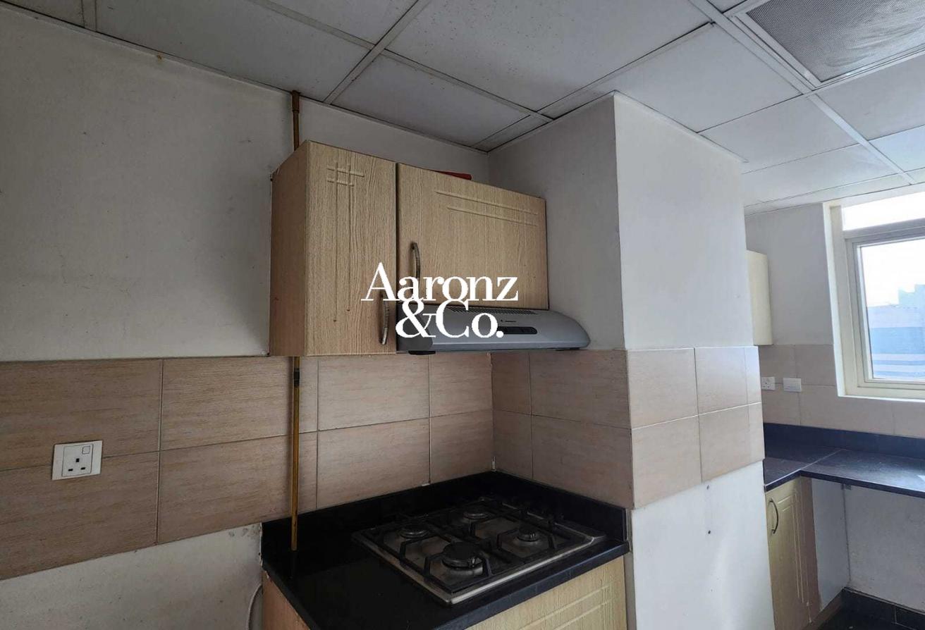 Vacant | Spacious Layout w/ Balcony | Unfurnished photo 6