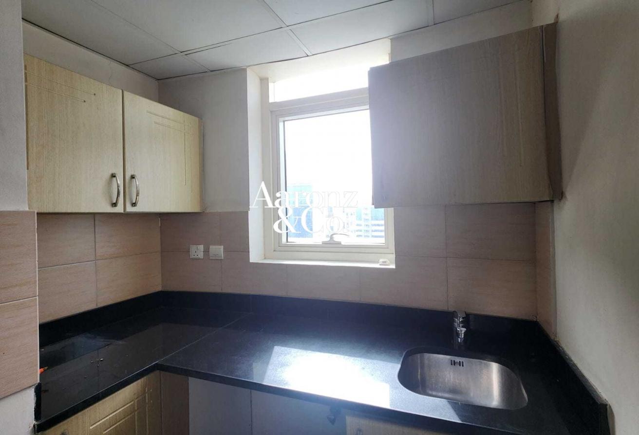 Vacant | Spacious Layout w/ Balcony | Unfurnished photo 8