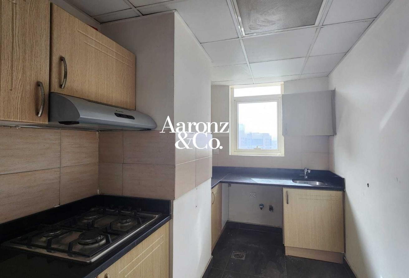 Vacant | Spacious Layout w/ Balcony | Unfurnished photo 5