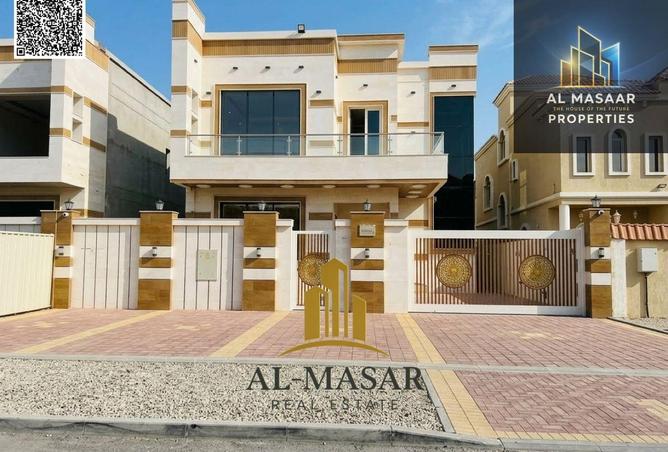 Two-story villa with a rooftop terrace and private