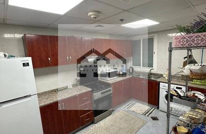Apartment - 1 Bedroom - 2 Bathrooms for sale in Orient Towers - Al Bustan - Ajman