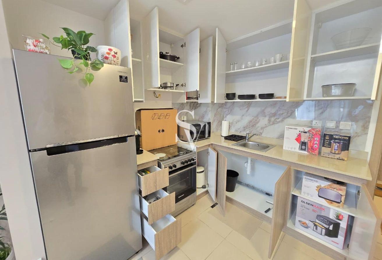 Beautifully Furnished Apartment | UNA Town Square photo 6