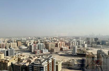 Apartment - 1 - 2 for sale in Sahara Tower 4 - Sahara Complex - Al Nahda - Sharjah