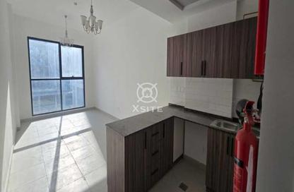 Apartment - 1 - 2 for rent in El Oneis 1 - Dubai Studio City - Dubai