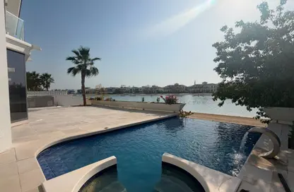 Villa - 4 Bedrooms - 6 Bathrooms for rent in Garden Homes Frond E - Garden Homes - Palm Jumeirah - Dubai