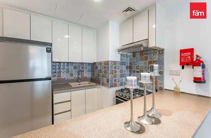 Apartment - 1 Bedroom - 2 Bathrooms for rent in Rabdan Building - Motor City - Dubai