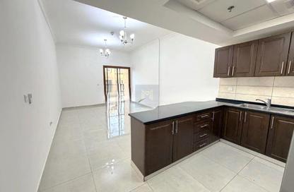 Apartment - Studio - 1 Bathroom for rent in Rokane G22 - District 11 - Jumeirah Village Circle - Dubai