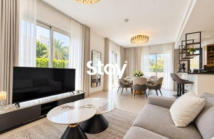 Villa - 4 - 5 for rent in Aura Gardens - Tilal Al Ghaf - Dubai