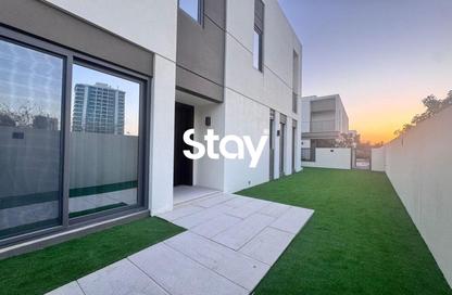 Villa - 4 - 5 for rent in Aura Gardens - Tilal Al Ghaf - Dubai