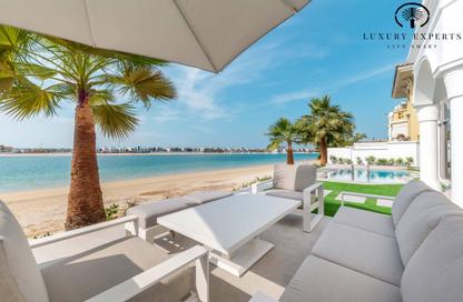 Villa - 4 - 4 for rent in Garden Homes Frond L - Garden Homes - Palm Jumeirah - Dubai