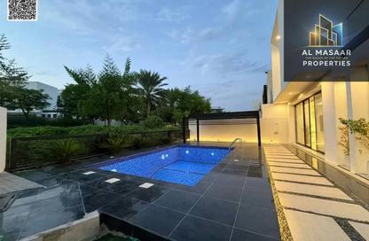 Villa - 4 - 6 for sale in Golf Community - Al Zorah - Ajman Villa - 4 - 6 for sale in Golf Community - Al Zorah - Ajman