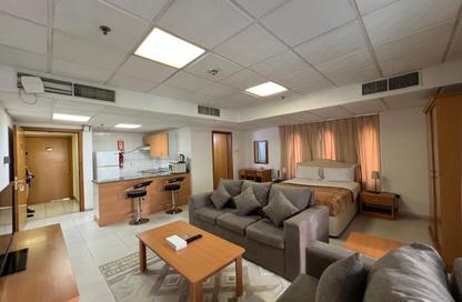 Apartment - Studio - 1 Bathroom for rent in Al Firdous Street - Tourist Club Area - Abu Dhabi