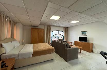 Apartment - Studio - 1 Bathroom for rent in Al Firdous Street - Tourist Club Area - Abu Dhabi