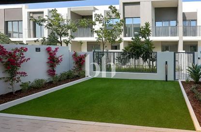 Townhouse - 3 - 4 for rent in Aura Gardens - Tilal Al Ghaf - Dubai
