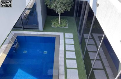 Villa - 4 Bedrooms - 6 Bathrooms for sale in Robinia - Masaar - Tilal City - Sharjah