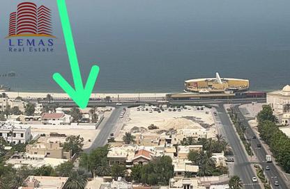 أرض - استوديو للبيع في طريق كورنيش عجمان - عجمان