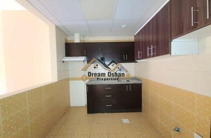 Apartment - 3 - 4 for rent in Silicon Gates 1 - Silicon Gates - Dubai Silicon Oasis - Dubai