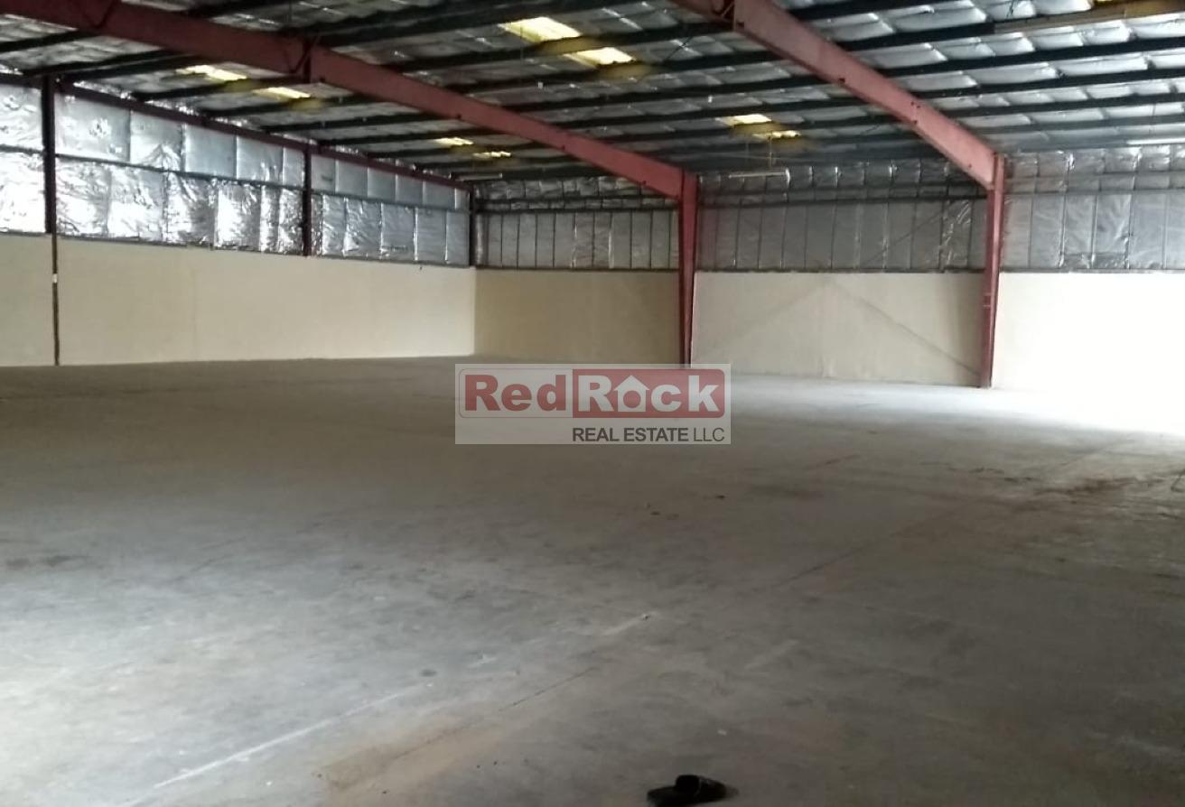 Investment Opportunity: Open Land with Warehouse