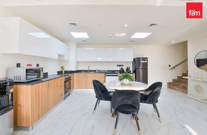 Townhouse - 3 - 5 for rent in Rukan 3 - Rukan - Dubai