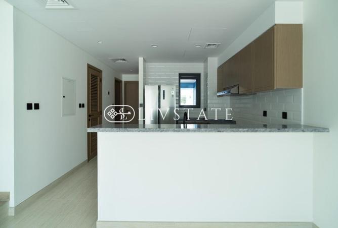 Single Row 4 BR Townhouse | Landscaped photo 3