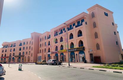 Shop - Studio - 1 Bathroom for rent in Building N15 - Persia Cluster - International City - Dubai