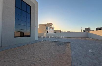 Villa - 5 Bedrooms - 6 Bathrooms for rent in Wadi Alshabak - Dubai
