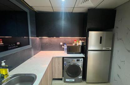 Apartment - 1 - 2 for sale in Regina Tower - District 12 - Jumeirah Village Circle - Dubai