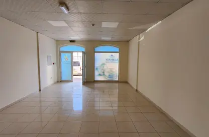 Shop - Studio for rent in Building X23 - England Cluster - International City - Dubai