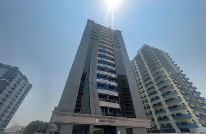 شقة - غرفة نوم - 2 حمامات للايجار في برج حمزة - مدينة دبي الرياضية - دبي