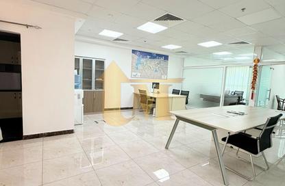 Office Space - Studio - 1 Bathroom for rent in Indigo Optima - Indigo Towers - International City - Dubai
