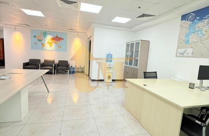Office Space - Studio - 1 Bathroom for rent in Indigo Optima - Indigo Towers - International City - Dubai